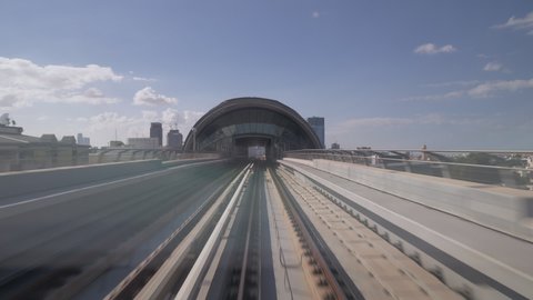 Dubai Metro ride, the tram drives to metro station