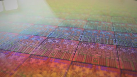 Silicone wafer with iridescent CPU litography.