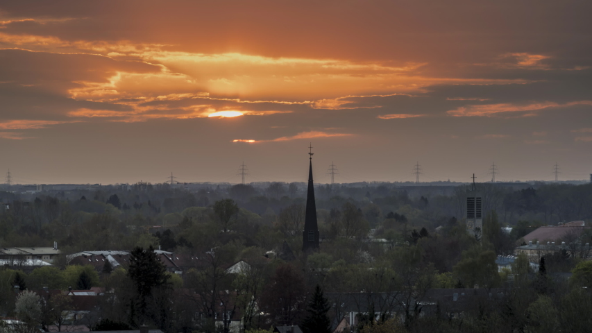 Dachau Germany sunsrise over old town city awekening time lapse video.