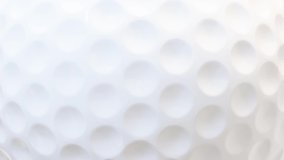 Closeup view of spinning golf ball