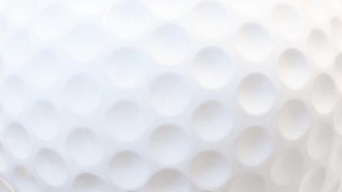 Closeup view of spinning golf ball