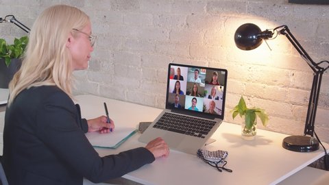Caucasian business woman remote worker video conferencing boss and colleagues by online call, employees team chat working from home office. Group videocall discussion concept