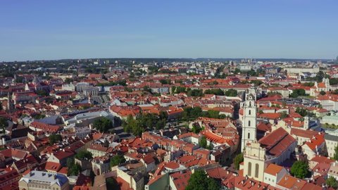 Aerial view of Old Town in Vilnius, capital city of Lithuania. Flying over the buildings and narrow streets of the old town.