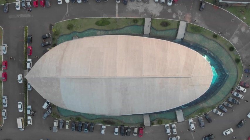 Aerial rotating over the church shaped like a whale