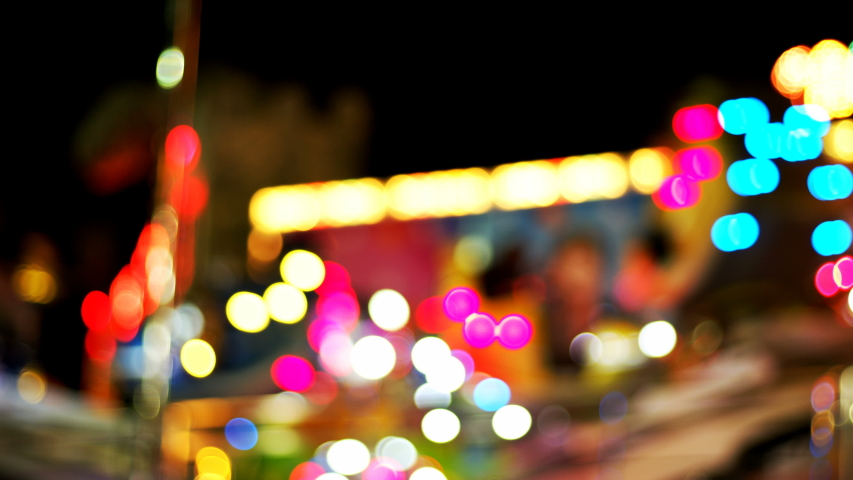 Amusement Park Bokeh Lights at Night Royalty-Free Stock Footage #1057453174