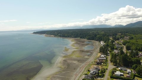 Aerial View of beach during a Sunny Summer day. Taken in Vancouver Island, British Columbia, Canada.