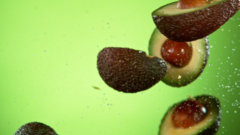 Super Slow Motion Shot of Flying Avocado, Collision in the Air at 1000fps.