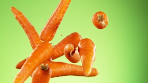 Super Slow Motion Shot of Flying Carrots, Collision in the Air at 1000fps.