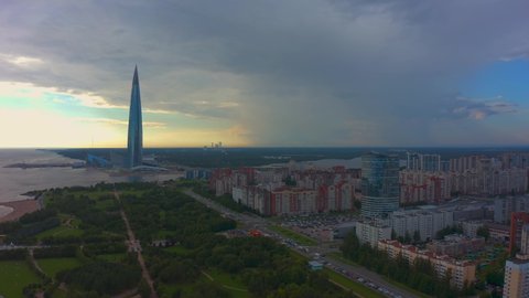 SAINT PETERSBURG, RUSSIA - AUGUST 8, 2020: Aerial view of the Lakhta Center skyscraper. Drone flight over the city in the evening.