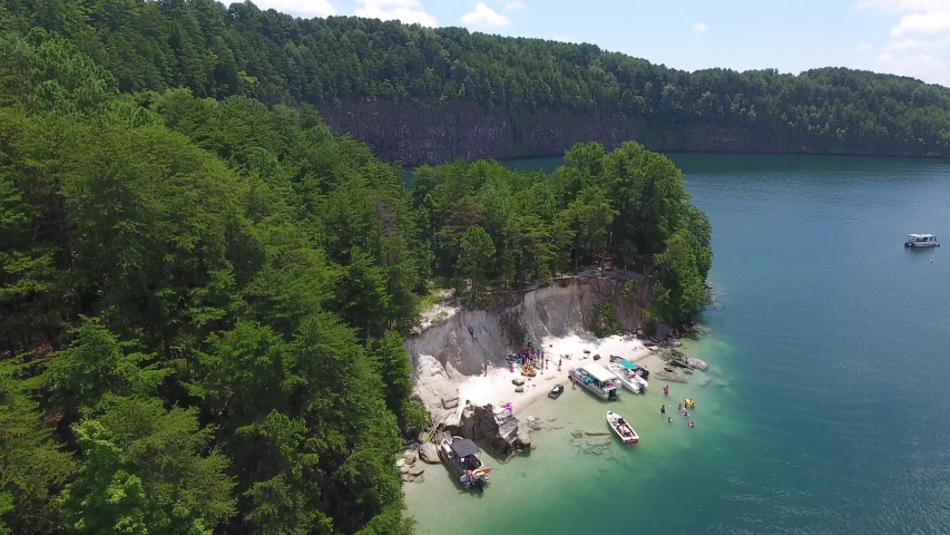 Aerial of boating on Lake Jocassee in upstate South Carolina on summer day for recreation. . High quality 4k footage