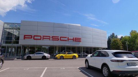 Kyiv, Ukraine - July 29, 2020: Porsche automobile dealership exterior. Porsche Automobile Holding is a German holding company with investments in the automotive industry.