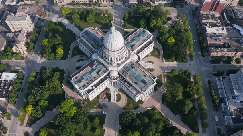 Flying above main square of Madison with Capitol Building at sunset, Wisconsin