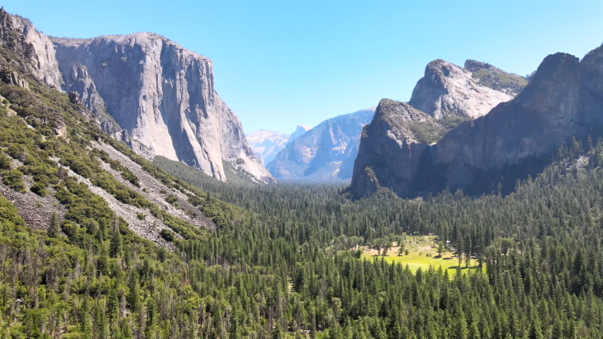 Yosemite Tunnel View Drone Gliding Through Mountain Meadows 4k Royalty-Free Stock Footage #1057530748