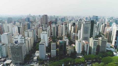 aerial view tracking above the buildings of Sao Paulo shot in 4K. Sao Paulo. Brazil.
