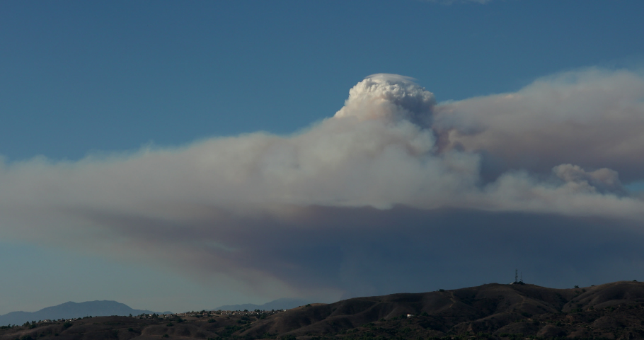 Intense smoke rises from the second Ranch fire in the San Gabriel Mountains above Azusa, California.