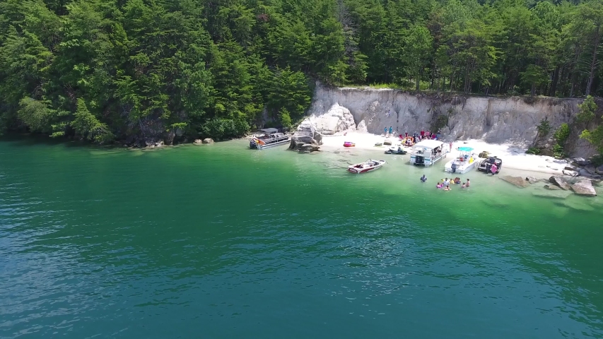 Aerial of boating on Lake Jocassee in upstate South Carolina on summer day for recreation. . High quality 4k footage