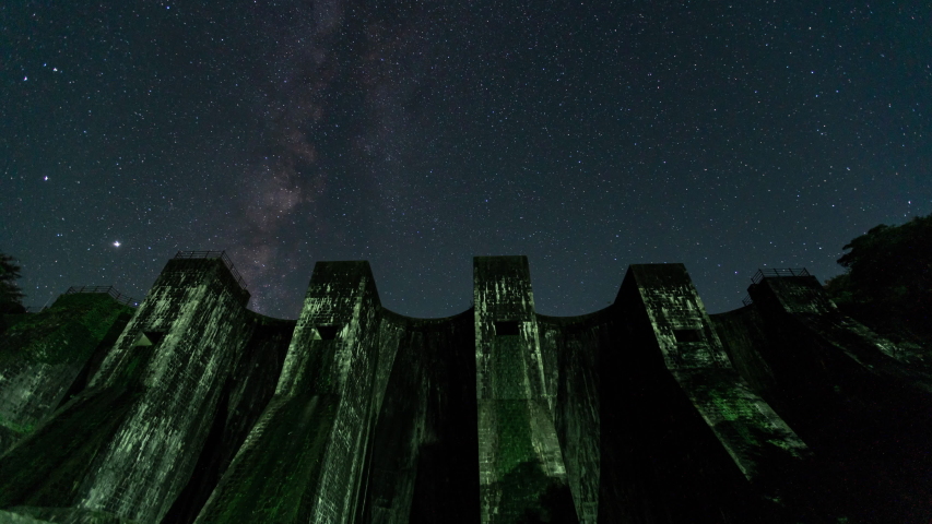 A photo of a historic dam and the Milky Way in Kanonji City, Kagawa Prefecture, Japan