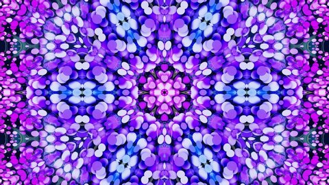 Star symmetry. Kaleidoscope effect from wavy shiny liquid surface with distorted circles float like drops of paint in oil. Creative background with multicolor gradient in 4k. 3d