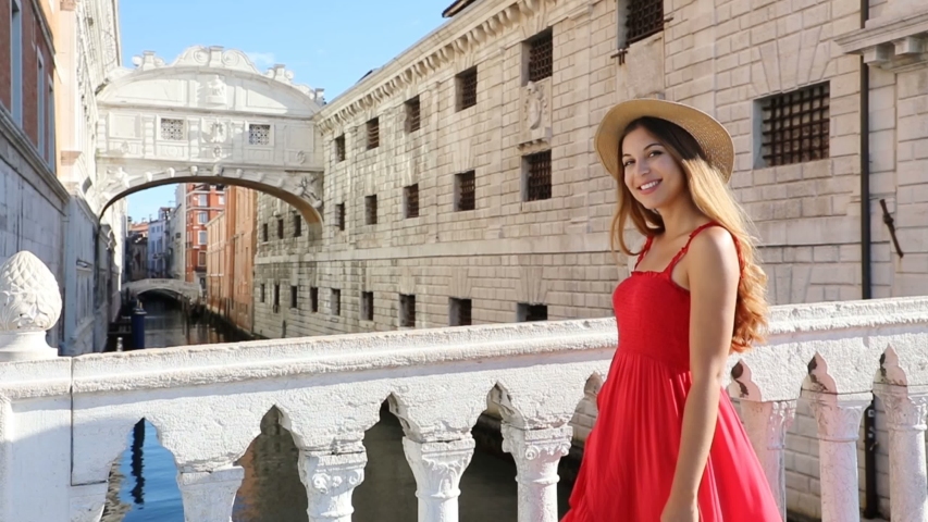 Young woman with long dress in Venice, Italy