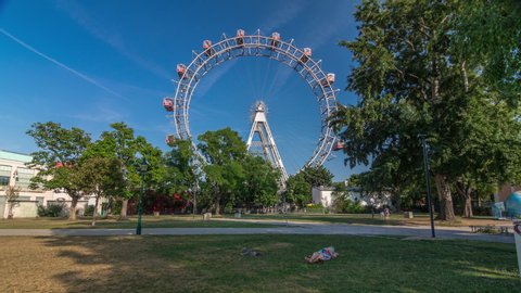 Wiener Riesenrad in Prater timelapse hyperlapse - oldest and biggest ferris wheel in Austria. Symbol of Vienna city. View from park