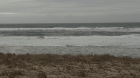 Stormy ocean background. Waves breaking on beach. Atlantic Ocean 