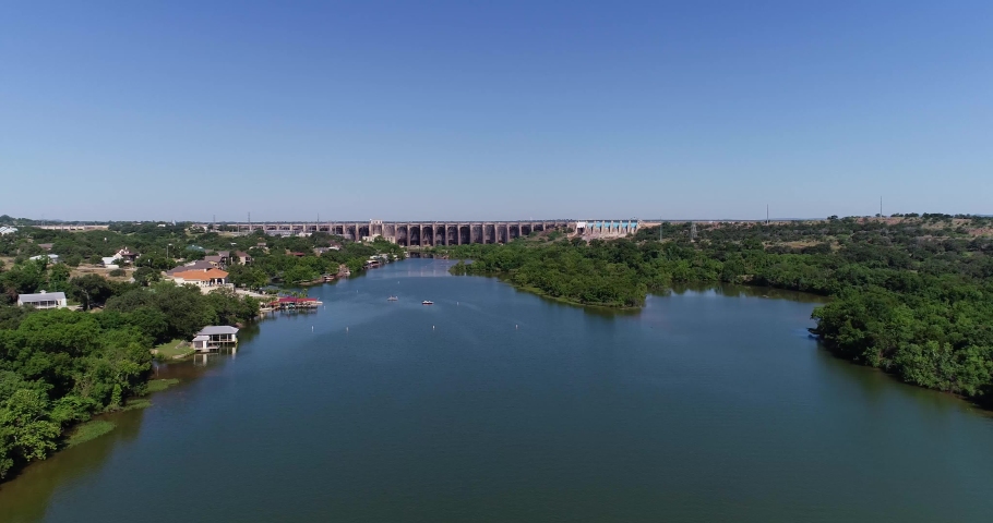 Aerial video of the Buchanan dam on Lake Buchanan and Inks Lake in Texas.
