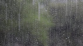Fall Rain Through Wet Window With Raindrops
