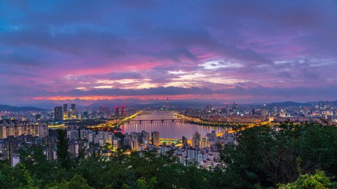 Time lapse 4k Sunrise of Seoul city at han river in South Korea.Zoom in