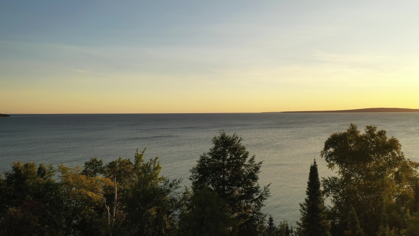 Aerial view of Lake Superior in Northern Wisconsin near Apostle islands National Lakeshore. The Great Lakes. Calm water at dawn, sunny morning.  