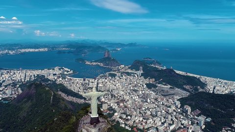 Panorama Landscape of Christ the  Redeemer Statue, Rio de Janeiro, Brazil. Vacation travel. Travel destination. Rio Tropical Touristic City. Rio de Janeiro, Brazil. Aerial Panoramic Sugarloaf Mountain