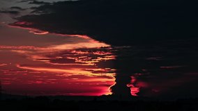 Dramatic time laps of red clouds moving after sunset, 4k, Amazing colours of sky