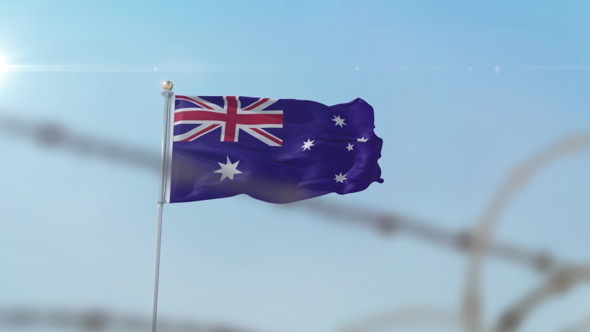 Flying flag of Australia behind barbed wire fence. Conceptual  3D animation Royalty-Free Stock Footage #1057625794