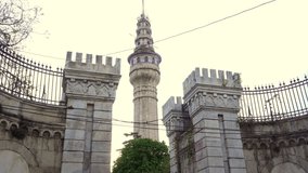 old Ottoman period gothic style architecture made wall in front of the fire tower in Istanbul great perspective angle perfect architectural structure 4K video buying now.