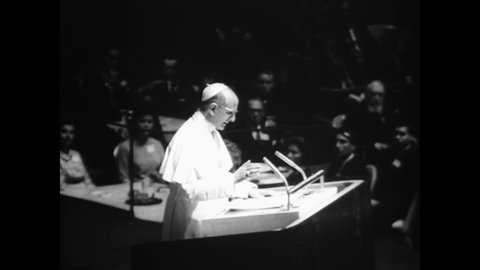 CIRCA 1965 - Pope Paul VI concludes a speech in French for the UN General Assembly, then begins mass at night at Yankee Stadium.