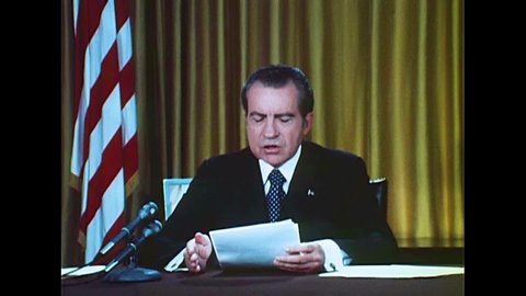 CIRCA 1970s - President Richard Milhous Nixon reads statements to do with charges in the Watergate Scandal, in Washington, D.C., in 1973.
