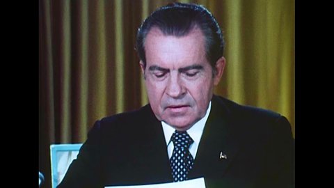 CIRCA 1970s - President Richard Milhous Nixon reads statements regarding charges to do with the Watergate Scandal, in Washington, D.C., in 1973.