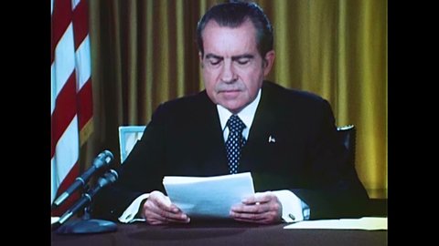 CIRCA 1970s - President Richard Milhous Nixon reads a statement regarding charges to do with the Watergate Scandal, in Washington, D.C., in 1973.