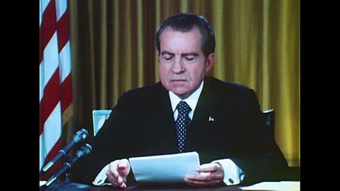CIRCA 1970s - President Richard Milhous Nixon reads a statement regarding charges to do with the Watergate Scandal, in Washington, D.C., in 1973.