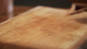 Very Close-up, Bean grains on a delicious background and wood floor passes in front of the camera in slow motion. Macro, 4K, Phantom Camera,900 fps video.