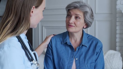 Doctor Talking Elderly Woman Patient Medical Stock Footage Video (100% ...