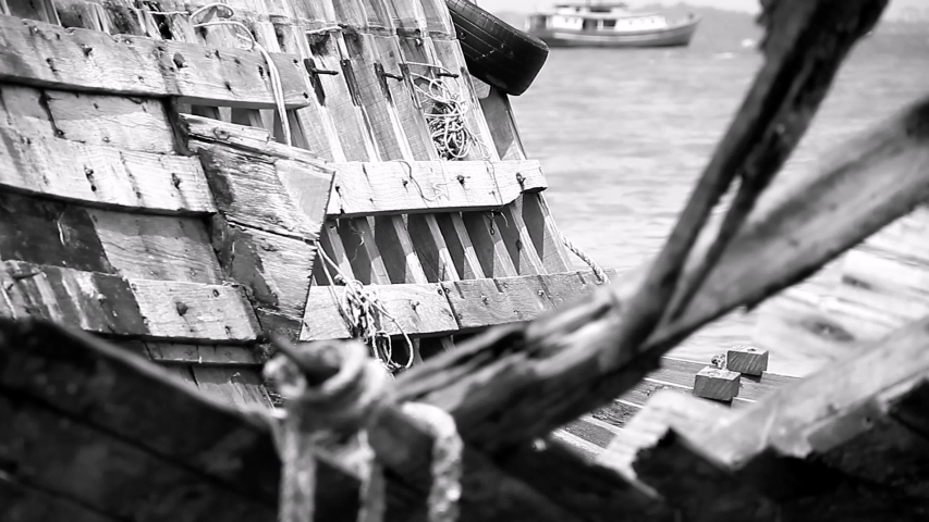 Damaged fishing boat is stranded on the beach