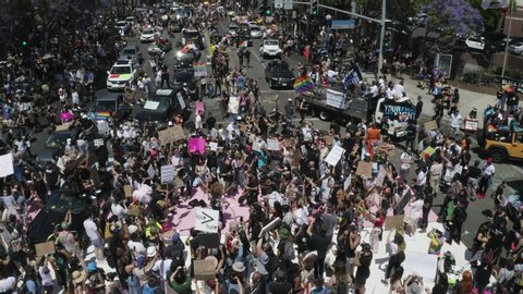 Los Angeles , California / United States - 06 14 2020: Aerial View of Thousands of People Dancing at LS LGBT Pride on Boulevard Intersection in West Hollywood Together With Black Lives Matter Protest