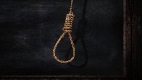Rope noose on background, a loop of rope for hanging on a Blackboard Blured Background