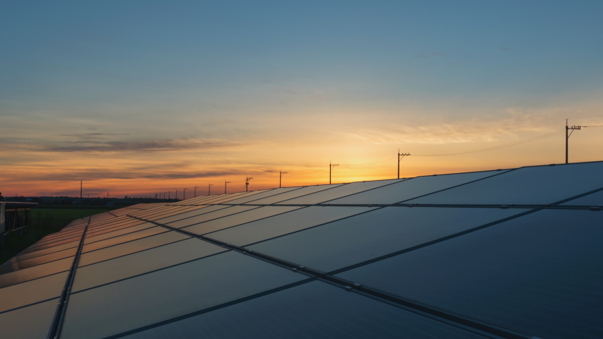 Time-lapse 4K large industrial Solar Energy Farm producing concentrated solar power.Day to night  | Shutterstock HD Video #1057662526