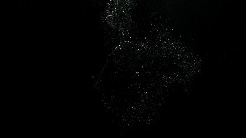 A big bubble ring bursting and spreading bubbles over a black background from the Submerge collection - Water VFX Video Element. | Shutterstock HD Video #1057663120