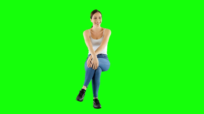 Happy Young Girl Sitting And Waving Her Hand Green Screen