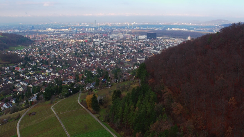 Drone Flying Over Neighborhoods Next Rhine River. Basel City Skyline, Switzerland