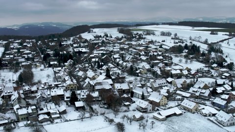 Drone Flying at winter over snowy Basel City Skyline, Switzerland