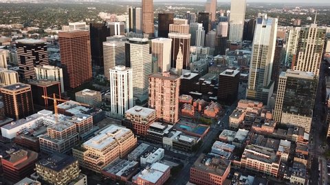 Downtown Denver Colorado Skyline. Drone Aerial View on Business Skyscrapers Under Evening Sunlight