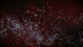 This stock motion graphics video shows an elegant red bokeh background made of many small particles and air bubbles.